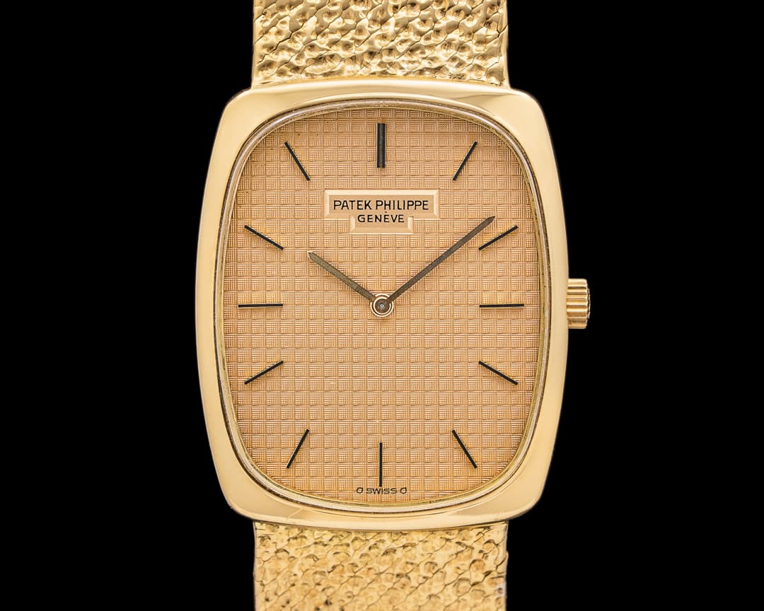 Patek Philippe 3567 Ellipse 18K Yellow Gold Integrated Bracelet Champagne Dial