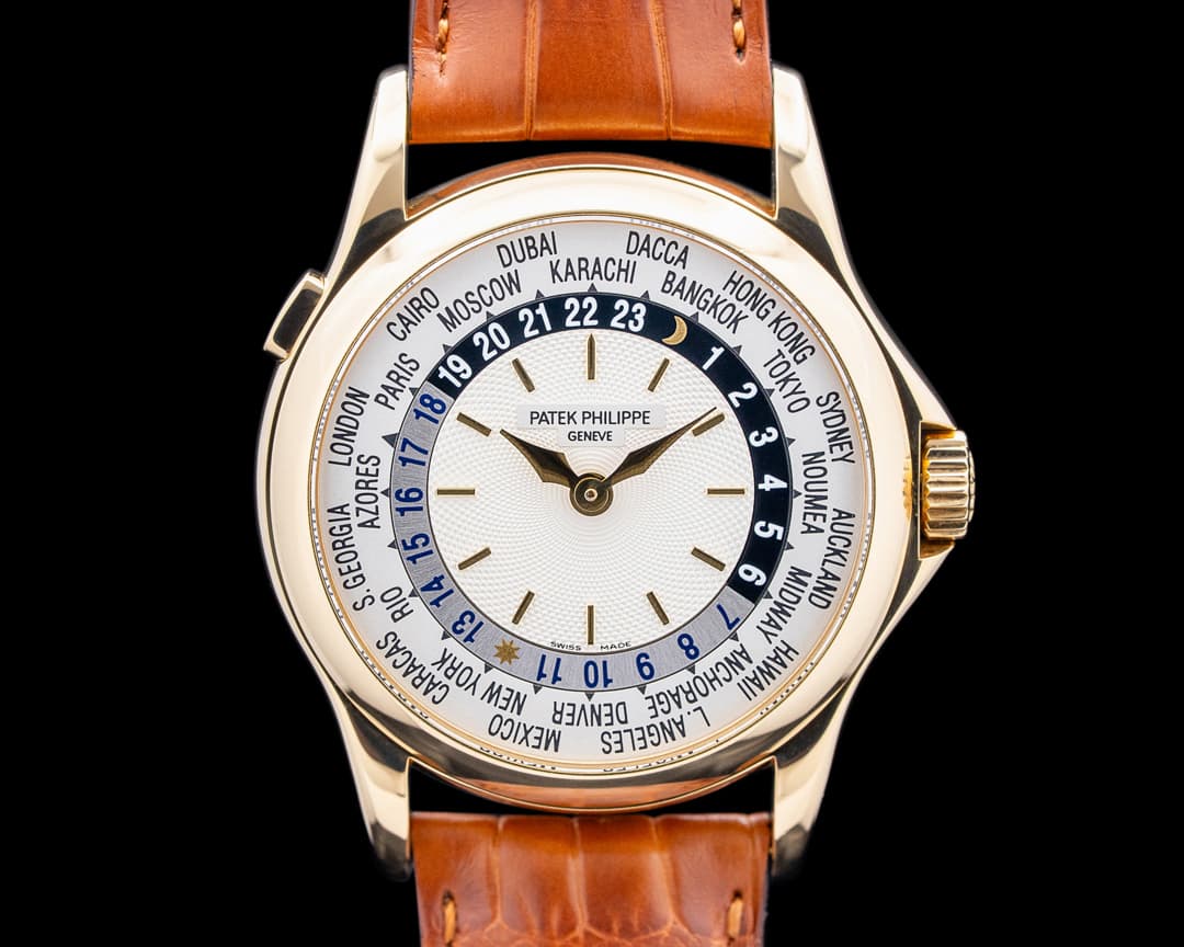 Patek Philippe 5110J World Time 18K Yellow Gold Silver Dial