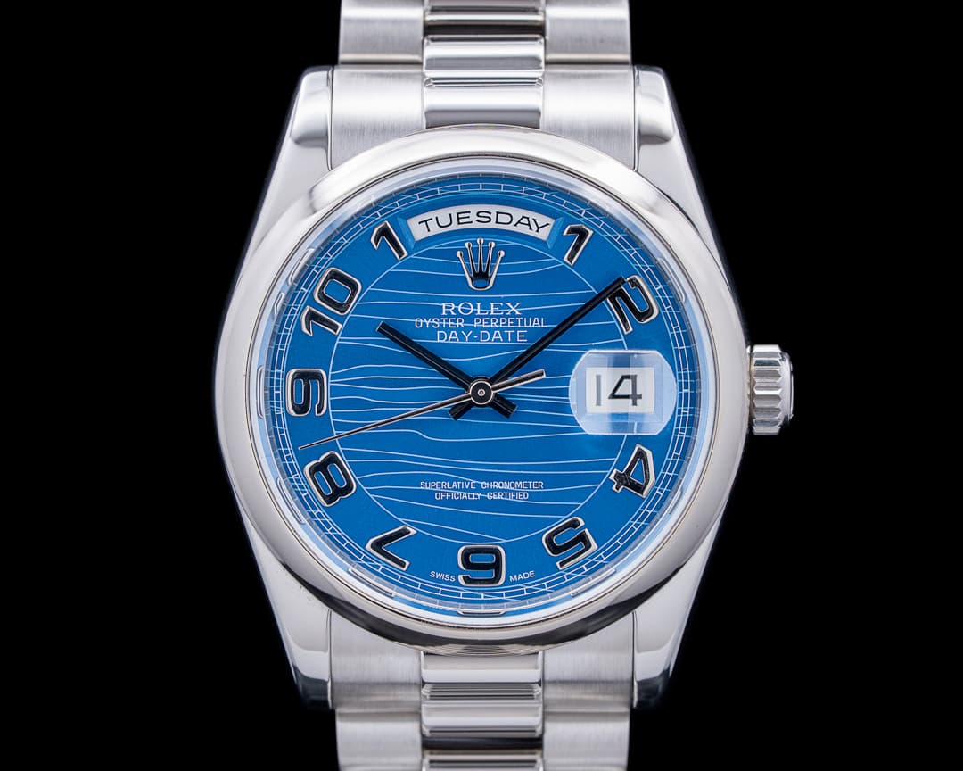 Rolex 118206 Day-Date 36 Platinum Blue Wave Dial Circa. 2000