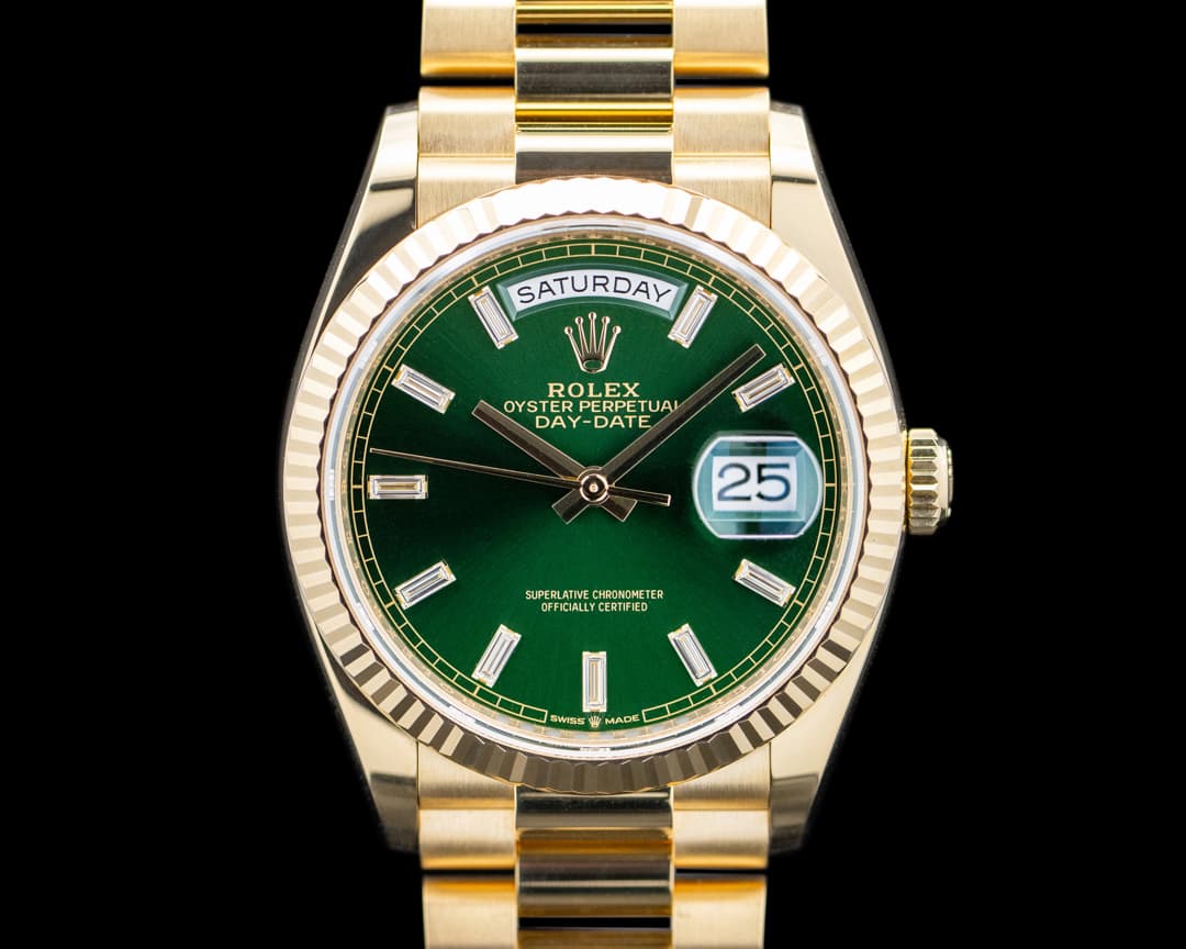 Rolex 128238 Day-Date 36 18K Yellow Gold Green Baguette Dial 2026
