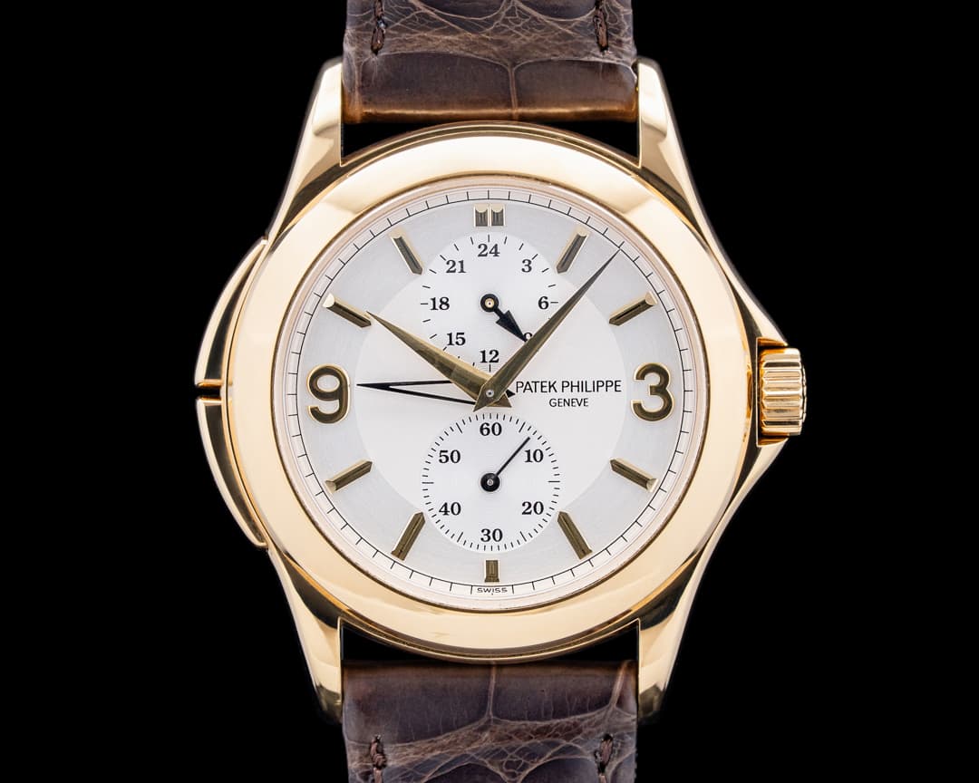 Patek Philippe 5134J-011 Calatrava Travel Time 18K Yellow Gold Silver Dial